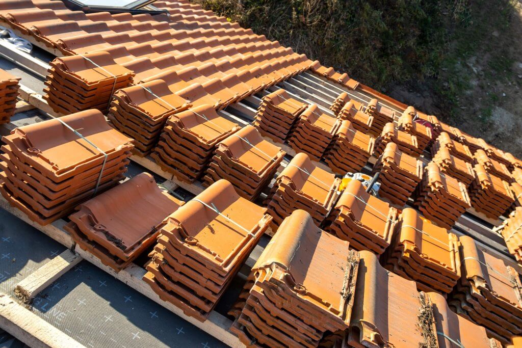 stacks of yellow ceramic roofing tiles for coverin 2022 06 23 08 45 50 utc 1