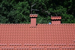 high quality red metal tile roof of a house agains 2022 11 14 16 05 14 utc 1