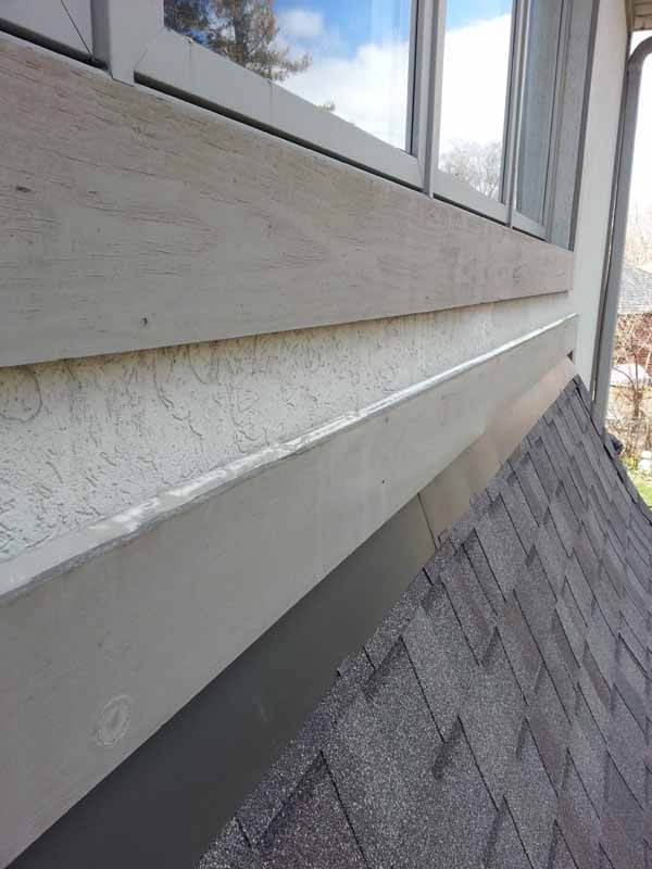 Roof flashing repair on residential property