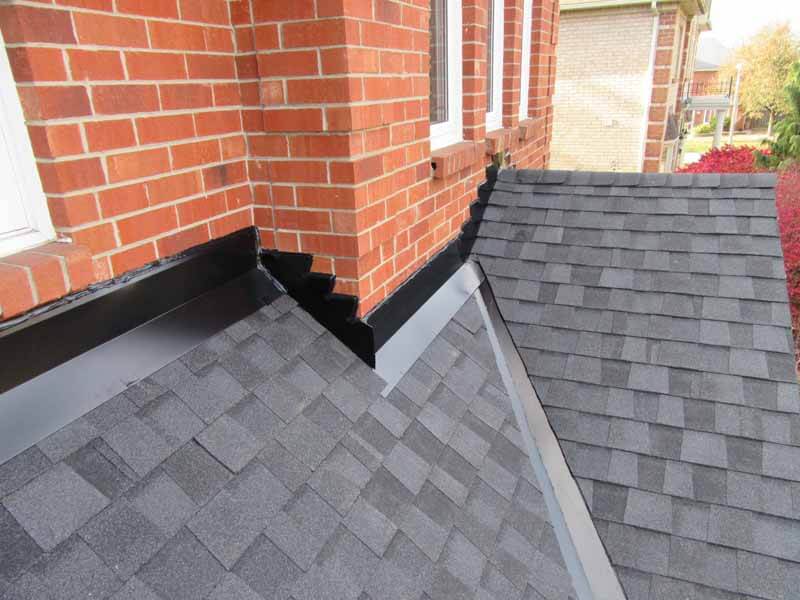 Chimney flashing failure on residential shingle roof requiring repair